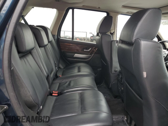 2009 Land Rover Range Rover Sport HSE z VIN SALSK254X9A197575, wystawiony jako Copart lot #56065305 z przebiegiem 127 760 mil mil oraz Szkoda całkowita • Salvage title. Historia ofert i sprzedaży dostępna na DreamBid. Obrazek 11.
