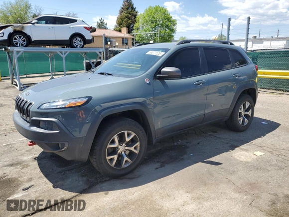 2014 Jeep Cherokee Trailhawk z VIN 1C4PJMBBXEW134939, wystawiony jako Copart lot #56579125 z przebiegiem 155 693 mil mil oraz Czysty tytuł • Clean title. Historia ofert i sprzedaży dostępna na DreamBid. Obrazek 1.