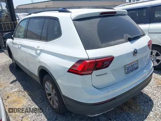 2018 Volkswagen Tiguan S with VIN 3VV1B7AX8JM032990, listed as a IAAI auction lot 42279807 with 74,185 mi miles and . Bid and sale history available at DreamBid. Image 3.