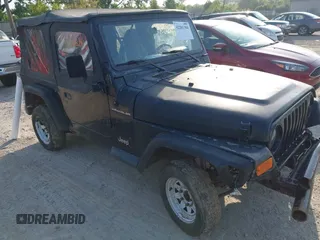 1997 Jeep Wrangler SE with VIN 1J4FY29P7VP529601, listed as a IAAI auction lot 42281304 with 236,065 mi miles and . Bid and sale history available at DreamBid. Image 1.