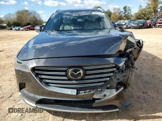 2017 Mazda CX-9 Grand Touring z VIN JM3TCADY8H0138866, wystawiony jako Copart lot #80894184 z przebiegiem Nie podano mil oraz Szkoda całkowita • Salvage title. Historia ofert i sprzedaży dostępna na DreamBid. Obrazek 5.