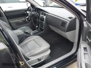2006 Dodge Charger with VIN 2B3KA43G56H182676, listed as a IAAI auction lot 42052425 with 301,664 mi miles. Bid and sale history available at carsss.com. Image 5.