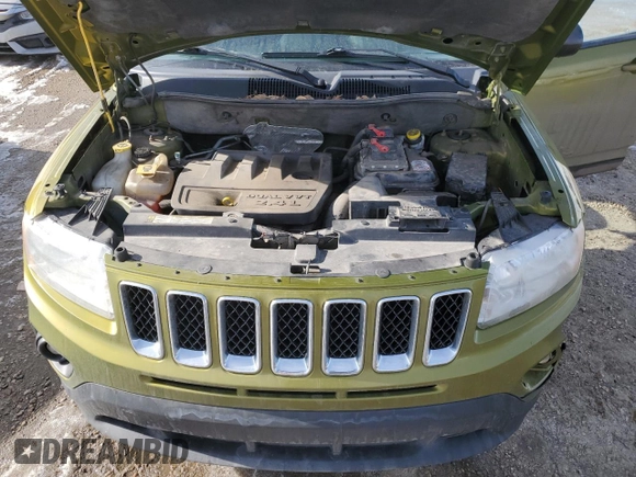 2012 Jeep Compass High Altitude with VIN 1C4NJDAB7CD554630, listed as a Copart auction lot 49915565 with 266,206 mi miles and Salvage Title. Bid and sale history available at carsss.com. Image 12.