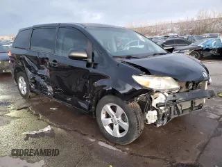 2014 Toyota Sienna L with VIN 5TDZK3DC1ES486586, listed as a Copart auction lot 84680574 with 122,332 mi miles and Salvage Title. Bid and sale history available at carsss.com. Image 4.