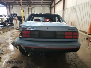 1989 Chevrolet Cavalier with VIN 1G1JC1113KJ278292, listed as a Copart auction lot 44942375 with 85,604 mi miles and Salvage Title. Bid and sale history available at DreamBid. Image 6.