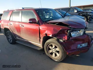 2011 Toyota 4Runner SR5 with VIN JTEZU5JR6B5017554, listed as a IAAI auction lot 41356165 with 212,014 mi miles. Bid and sale history available at carsss.com. Image 1.