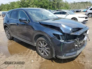 2018 Mazda CX-5 Grand Touring with VIN JM3KFADM3J1312519, listed as a Copart auction lot 56276685 with 109,486 mi miles and Clean title. Bid and sale history available at DreamBid. Image 4.