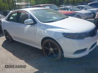 2012 Kia Forte EX with VIN KNAFU4A28C5545230, listed as a IAAI auction lot 42024581 with 292,797 mi miles. Bid and sale history available at carsss.com. Image 1.