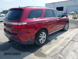 2013 Dodge Durango Crew z VIN 1C4RDJDG6DC672934, wystawiony jako IAAI lot #42542073 z przebiegiem 181 812 mil mil oraz . Historia ofert i sprzedaży dostępna na DreamBid. Obrazek 4.