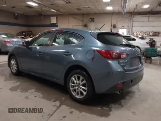 2014 Mazda 3 i Touring z VIN JM1BM1L71E1148770, wystawiony jako IAAI lot #41420978 z przebiegiem 137 385 mil mil oraz . Historia ofert i sprzedaży dostępna na DreamBid. Obrazek 3.