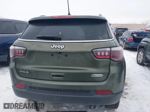 2018 Jeep Compass Altitude with VIN 3C4NJDBB1JT479462, listed as a IAAI auction lot 41276119 with 58,895 mi miles and . Bid and sale history available at carsss.com. Image 16.