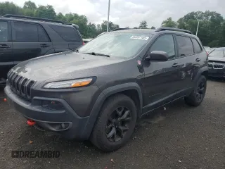 2015 Jeep Cherokee Trailhawk with VIN 1C4PJMBS0FW655167, listed as a Copart auction lot 64597165 with 193,779 mi miles and Clean title. Bid and sale history available at DreamBid. Image 1.