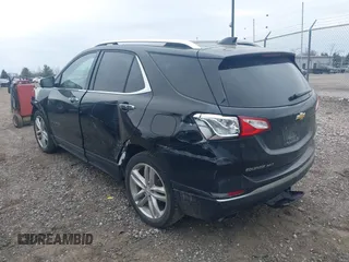 2018 Chevrolet Equinox Premier with VIN 2GNAXNEX9J6298714, listed as a IAAI auction lot 41998248 with 139,691 mi miles and . Bid and sale history available at DreamBid. Image 3.