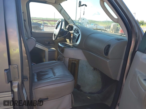 2003 Ford Econoline Cargo Recreational with VIN 1FDRE14L93HA06545, listed as a IAAI auction lot 42200611 with 160,671 mi miles and . Bid and sale history available at DreamBid. Image 5.
