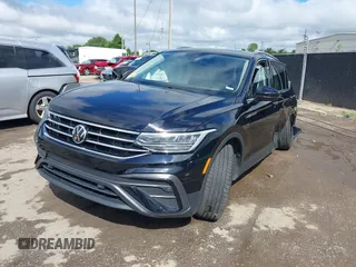 2023 Volkswagen Tiguan SE with VIN 3VV3B7AX4PM136264, listed as a IAAI auction lot 39724241 with 8,774 mi miles and . Bid and sale history available at DreamBid. Image 2.