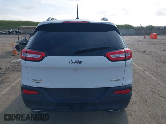 2016 Jeep Cherokee Latitude with VIN 1C4PJMCS1GW185442, listed as a IAAI auction lot 42033699 with 123,306 mi miles. Bid and sale history available at carsss.com. Image 16.