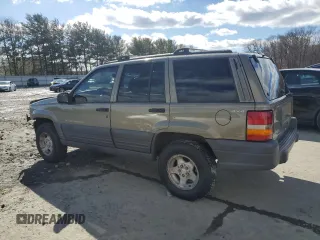 1997 Jeep Grand Cherokee Laredo with VIN 1J4GZ58SXVC569171, listed as a Copart auction lot 45657745 with 101,648 mi miles and Salvage Title. Bid and sale history available at carsss.com. Image 2.