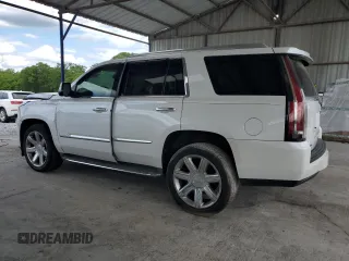 2016 Cadillac Escalade Luxury Collection z VIN 1GYS3BKJ0GR208476, wystawiony jako Copart lot #55760685 z przebiegiem 123 549 mil mil oraz Szkoda całkowita • Salvage title. Historia ofert i sprzedaży dostępna na DreamBid. Obrazek 2.