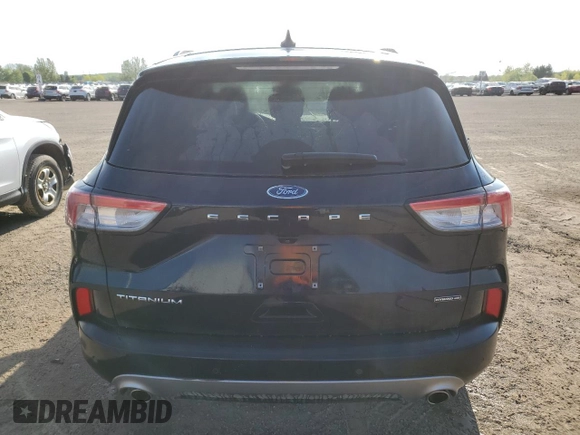 2021 Ford Escape Titanium Hybrid с VIN 1FMCU9DZ2MUA10439, выставлен на аукционе Copart как лот 58440785 с пробегом 84 803 миль миль и Списание • Salvage title. История ставок и продаж доступна на DreamBid. Изображение 6.
