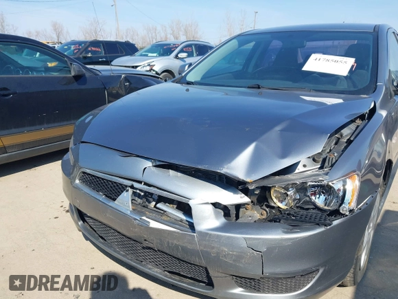 2014 Mitsubishi Lancer ES z VIN JA32U2FU5EU000609, wystawiony jako IAAI lot #41785055 z przebiegiem 140 496 mil mil oraz . Historia ofert i sprzedaży dostępna na DreamBid. Obrazek 6.