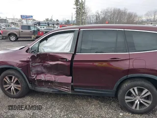 2016 Honda Pilot EX-L with VIN 5FNYF6H58GB072368, listed as a IAAI auction lot 41055222 with 130,813 mi miles. Bid and sale history available at carsss.com. Image 14.