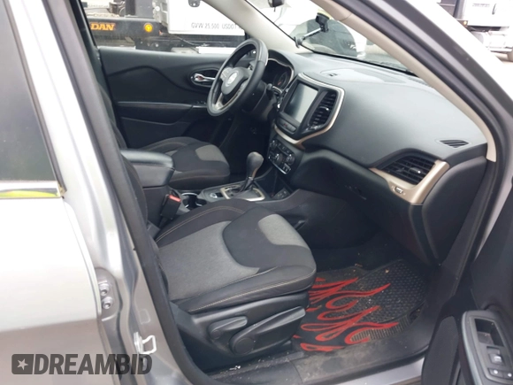 2014 Jeep Cherokee Latitude with VIN 1C4PJLCS1EW105984, listed as a IAAI auction lot 42242732 with 89,325 mi miles and . Bid and sale history available at DreamBid. Image 5.