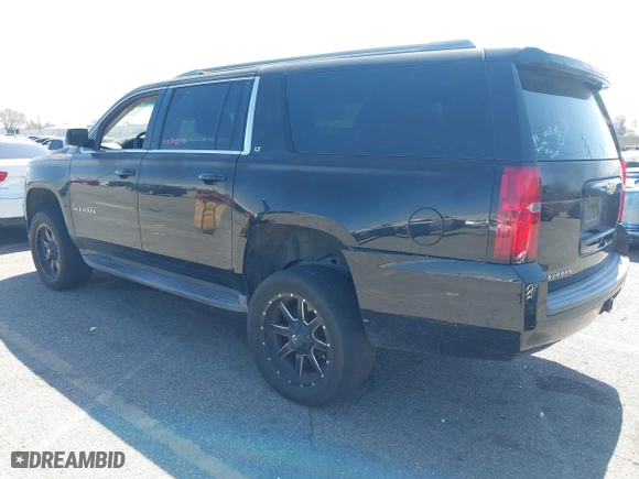 2015 Chevrolet Suburban LT with VIN 1GNSCJKC2FR281629, listed as a IAAI auction lot 41849300 with 133,842 mi miles. Bid and sale history available at carsss.com. Image 3.