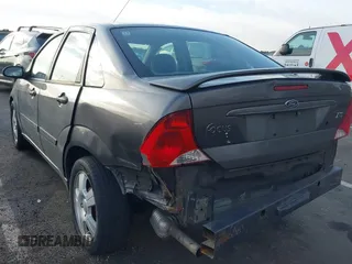 2004 Ford Focus ZTS with VIN 1FAFP38Z74W160198, listed as a IAAI auction lot 41880264 with 159,391 mi miles and . Bid and sale history available at carsss.com. Image 3.