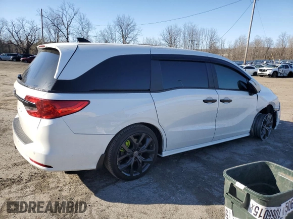 2021 Honda Odyssey EX-L with VIN 5FNRL6H78MB019258, listed as a Copart auction lot 52496285 with 33,734 mi miles and Salvage Title. Bid and sale history available at DreamBid. Image 3.