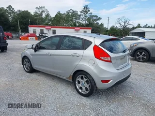 2011 Ford Fiesta SES with VIN 3FADP4FJ5BM232264, listed as a IAAI auction lot 40982622 with 184,726 mi miles. Bid and sale history available at carsss.com. Image 3.