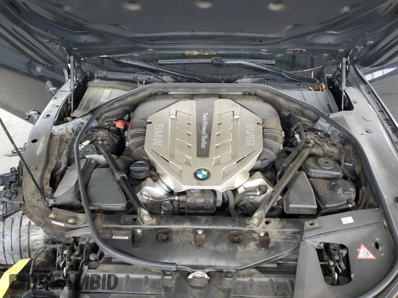 2011 BMW 7 Series 750i xDrive with VIN WBAKC6C56BC394810, listed as a Copart auction lot 79025014 with 152,399 mi miles and Salvage title. Bid and sale history available at DreamBid. Image 11.