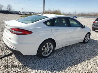 2019 Ford Fusion Hybrid SE with VIN 3FA6P0LU0KR188144, listed as a Copart auction lot 53237005 with 130,833 mi miles and Clean Title. Bid and sale history available at carsss.com. Image 3.