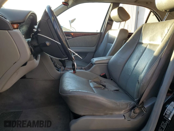 1999 Mercedes-Benz E-Class with VIN WDBJF82H9XX026911, listed as a Copart auction lot 48808835 with 205,953 mi miles and Salvage Title. Bid and sale history available at carsss.com. Image 7.