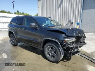 2017 Jeep Grand Cherokee Laredo with VIN 1C4RJEAG1HC813810, listed as a Copart auction lot 59703545 with 57,180 mi miles and Clean title. Bid and sale history available at DreamBid. Image 4.