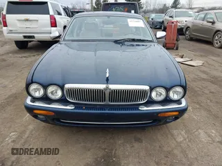 1998 Jaguar XJ Vanden Plas with VIN SAJKX6246WC832202, listed as a IAAI auction lot 41218807 with 96,589 mi miles and . Bid and sale history available at DreamBid. Image 12.