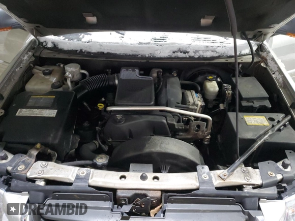 2005 GMC Envoy SLT with VIN 1GKDT13SX52287052, listed as a Copart auction lot 44387855 with 0 mi miles and Salvage Title. Bid and sale history available at carsss.com. Image 12.