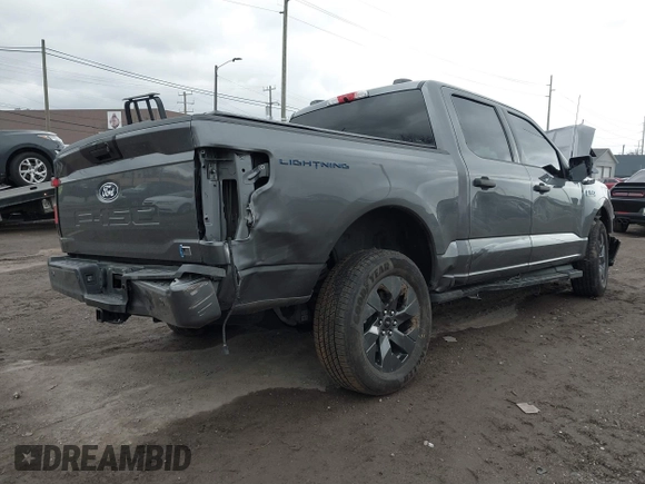 2024 Ford F-150 Lightning XLT z VIN 1FTVW3LK0RWG14334, wystawiony jako IAAI lot #41856218 z przebiegiem 2 037 mil mil oraz . Historia ofert i sprzedaży dostępna na DreamBid. Obrazek 4.
