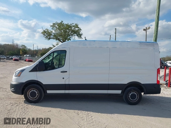2021 Ford Transit Cargo with VIN 1FTBR1C85MKA19997, listed as a IAAI auction lot 41431285 with 61,158 mi miles and . Bid and sale history available at DreamBid. Image 14.