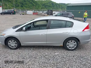 2010 Honda Insight LX with VIN JHMZE2H57AS008203, listed as a IAAI auction lot 42240869 with 150,562 mi miles and . Bid and sale history available at DreamBid. Image 14.