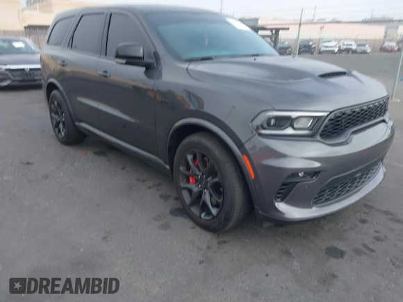 2023 Dodge Durango SRT 392 Premium z VIN 1C4SDJGJ2PC692935, wystawiony jako IAAI lot #41029734 z przebiegiem 7 191 mil mil oraz . Historia ofert i sprzedaży dostępna na DreamBid. Obrazek 1.