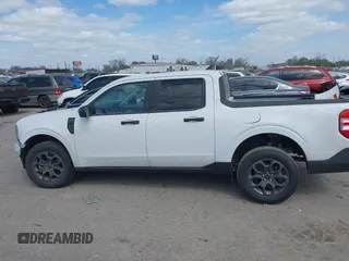 2023 Ford Maverick XL with VIN 3FTTW8E96PRA74020, listed as a IAAI auction lot 41782011 with 30,592 mi miles and . Bid and sale history available at DreamBid. Image 15.