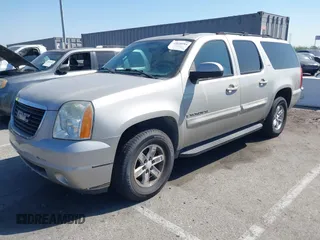 2007 GMC Yukon XL SLT with VIN 1GKFC16077R187116, listed as a IAAI auction lot 42020184 with 195,721 mi miles. Bid and sale history available at carsss.com. Image 2.
