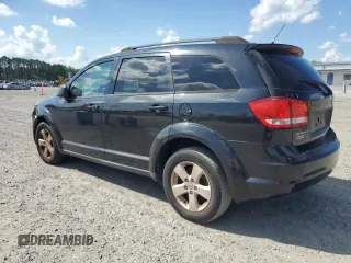2013 Dodge Journey SE with VIN 3C4PDCAB4DT537984, listed as a Copart auction lot 62683165 with 228,062 mi miles and Clean title. Bid and sale history available at DreamBid. Image 2.