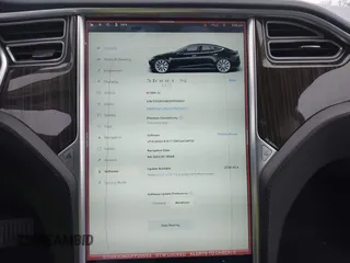 2013 Tesla Model S with VIN 5YJSA1CN0DFP20053, listed as a IAAI auction lot 41470660 with 61,568 mi miles and . Bid and sale history available at DreamBid. Image 19.