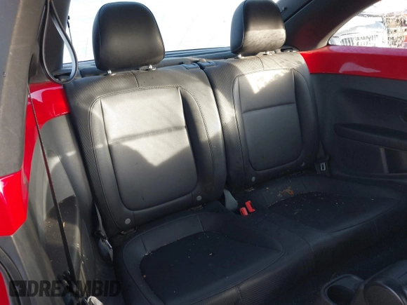 2014 Volkswagen Beetle 2.5L w/Sun with VIN 3VWJP7AT8EM629573, listed as a IAAI auction lot 41479054 with 73,950 mi miles and . Bid and sale history available at DreamBid. Image 8.