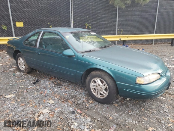 1997 Ford Thunderbird LX with VIN 1FALP6245VH171563, listed as a Copart auction lot 81970734 with 67,304 mi miles and Clean Title. Bid and sale history available at DreamBid. Image 4.