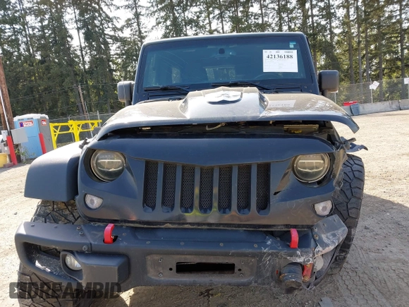 2015 Jeep Wrangler Unlimited Willys Wheeler with VIN 1C4BJWDG9FL750049, listed as a IAAI auction lot 42136188 with 115,328 mi miles and . Bid and sale history available at DreamBid. Image 13.