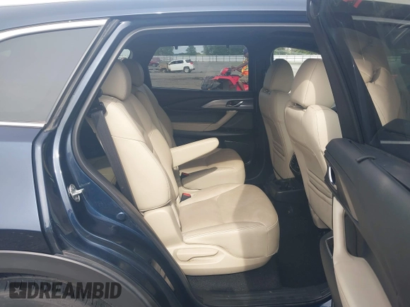 2020 Mazda CX-9 Grand Touring with VIN JM3TCBDY1L0402718, listed as a IAAI auction lot 42355511 with 87,205 mi miles and . Bid and sale history available at DreamBid. Image 8.