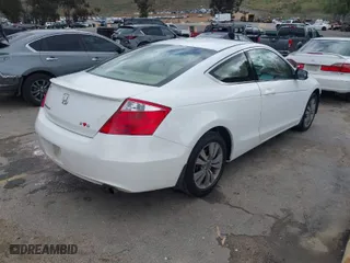 2009 Honda Accord Cpe EX-L with VIN 1HGCS12849A000477, listed as a IAAI auction lot 41783364 with 146,813 mi miles. Bid and sale history available at carsss.com. Image 4.