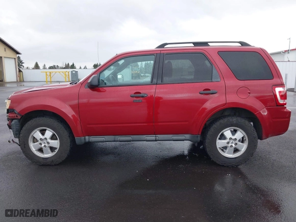 2011 Ford Escape XLT with VIN 1FMCU9D77BKB34262, listed as a IAAI auction lot 41198534 with 212,006 mi miles. Bid and sale history available at carsss.com. Image 14.